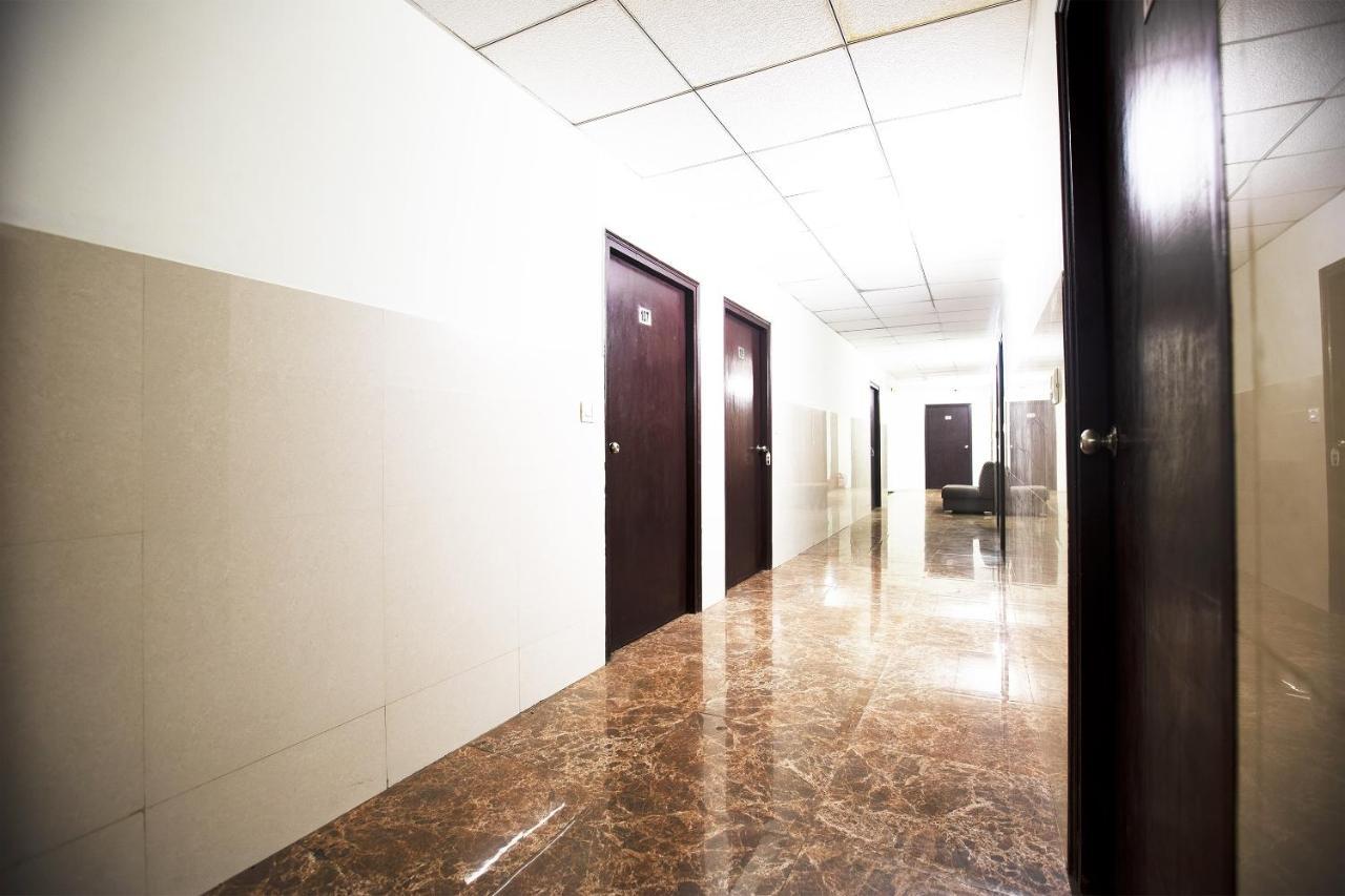 Oyo 44174 Hotel Mid Town Prime Harthala Kültér fotó